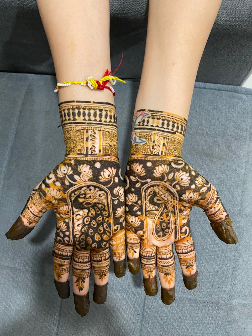 Bridal full-hand mehandi design with intricate mandala patterns
