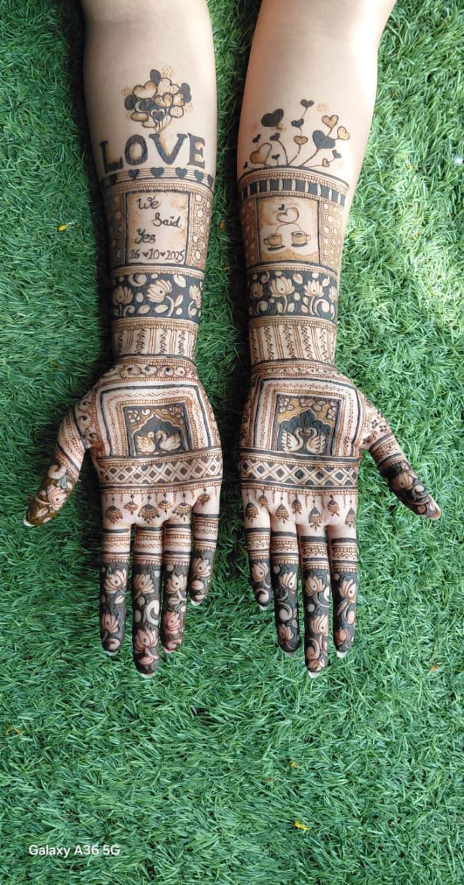 Arabic floral mehandi design on hands